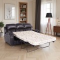 Sofa skórzana Boston z rozłożoną funkcją spania w ciemnym kolorze na tle eleganckiego salonu