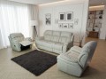 Skórzany komplet mebli wypoczynkowych 3+1+1 Boston z funkcją relaks w kolorze jasny beż (925) na tle eleganckiego salonu