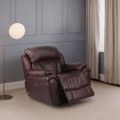 Fotel skórzany Boston, elektryczny z funkcją relax, w kolorze burgund, na tle eleganckiego salonu.